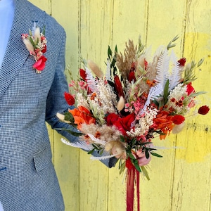 Bridal bouquet in terracotta and red dried flowers