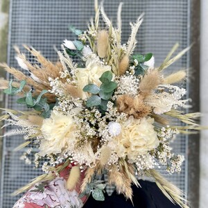 White and green bridal bouquet in dried flowers image 3