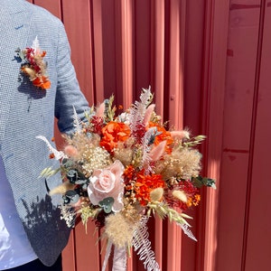 Terracotta and pink dried flower bridal bouquet