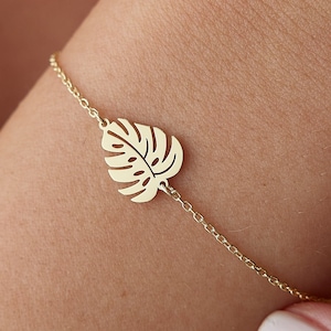 Armband i 14k guld med monsterablad: Smycken med tropiska bladverk