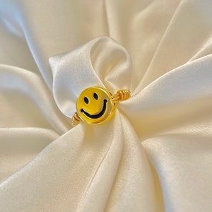 Smiley face wire-wrapped ring