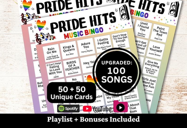 May include: A stack of Pride Hits Music Bingo cards with a rainbow heart and musical notes. The cards feature song titles and artist names, with the text "UPGRADED: 100 SONGS" and "50 + 50 Unique Cards".