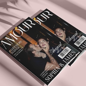 May include: Two magazines titled "AMOUR" and "The August Special Edition" are displayed. The cover features a couple kissing, with text reading "A Love Story In Style" and "Sophia & James". The background is a soft pink.