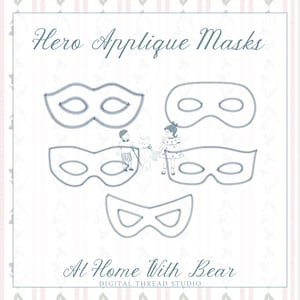 Puede incluir: Cinco máscaras de héroe bordadas en azul dispuestas en un patrón con una ilustración central de dos niños y un oso de peluche. El texto dice Hero Applique Masks en la parte superior y At Home With Bear Digital Thread Studio abajo.