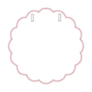 May include: A pink scalloped oval frame with two rectangular cutouts at the top.