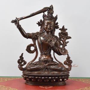 Hand-Carved Tibetan Manjushri / Jambiyang / Jampelyang Copper Statue Rupa in Oxidation finish from Patan, Nepal | Home Decor Garden Statues