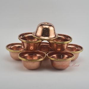 Finely Hand Carved Buddhist Tibetan Water Offering Bowls a Set of Eight Bowls made from Copper from Patan, Nepal for Altar Shrine Monastery