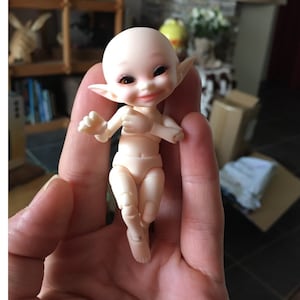 Tiny Realpuki BJD Doll set completo 1/13 BJD set completo Bambola artistica snodabile Bambole snodabili Corpo BJD Bambola snodabile in resina BJD Regalo di compleanno per ragazze