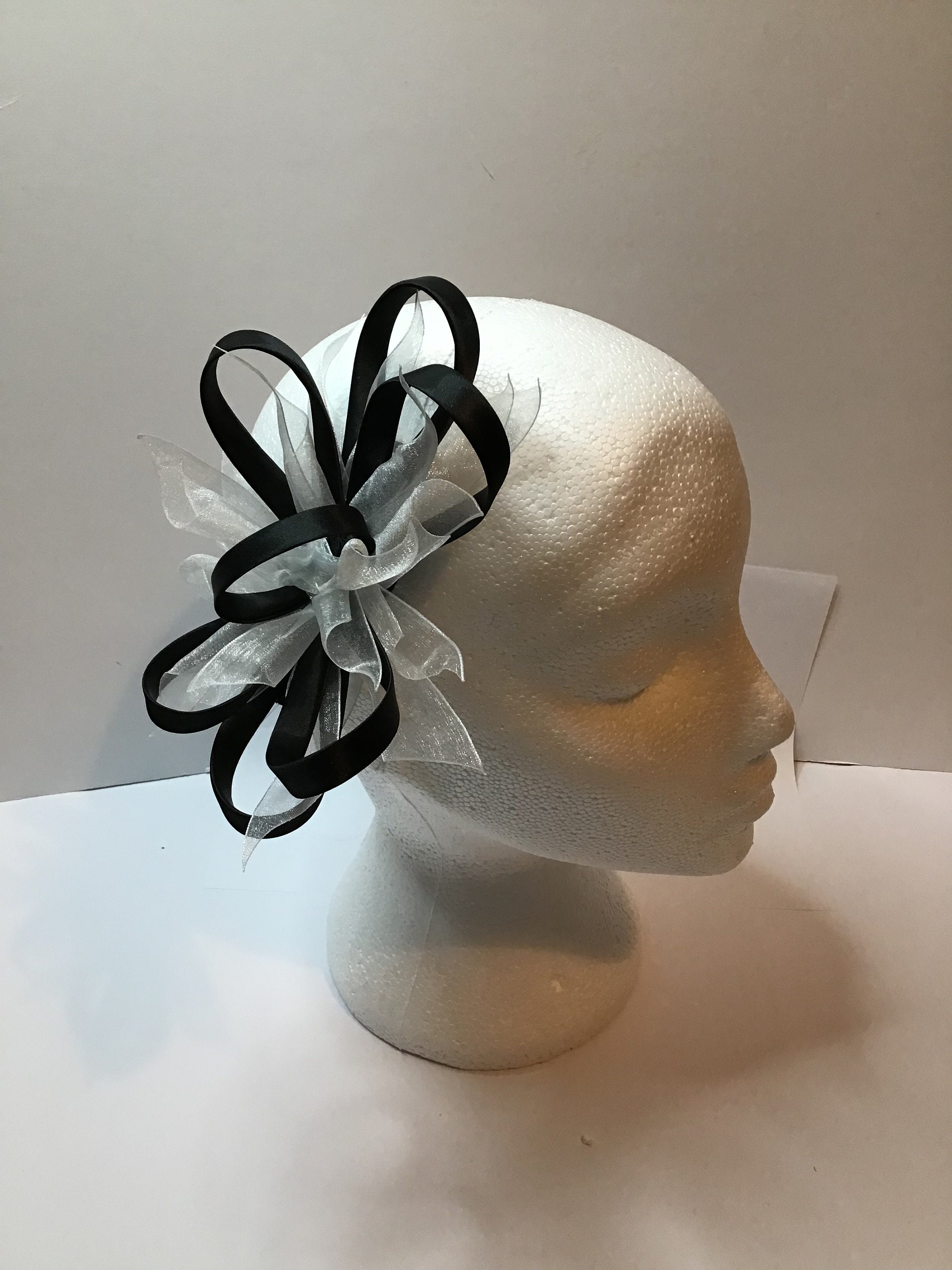 Elegant Black and White Fascinator

FAS3 0226 Kentucky Derby Hat | Black Fascinator w/ White Feathers  main image 3