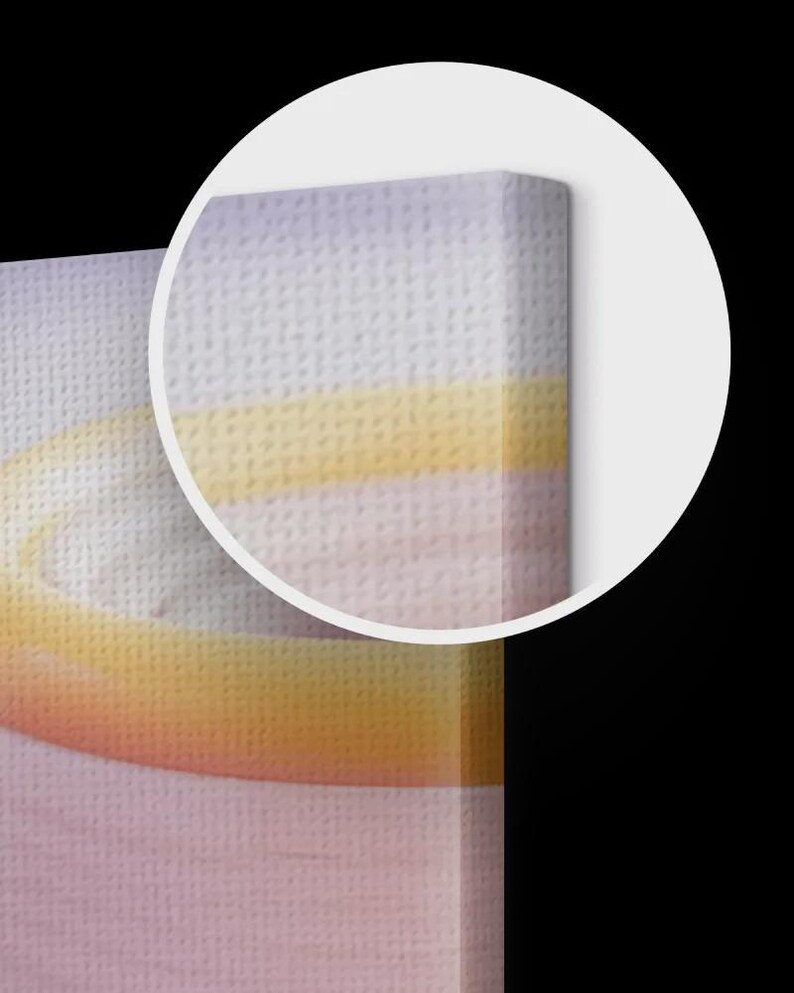 Puede incluir: Primer plano de una impresi&oacute;n en lienzo con una superficie suave y texturizada. La obra de arte presenta un degradado de colores, que transita del rosa al amarillo y al lavanda. El lienzo est&aacute; estirado sobre un marco de madera.