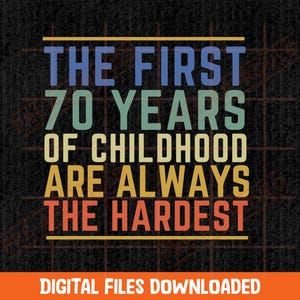 May include: A graphic design on a dark textured background featuring the text THE FIRST 70 YEARS OF CHILDHOOD ARE ALWAYS THE HARDEST in stacked lines of blue, green, yellow, and red, framed by horizontal lines and a faint grid pattern.