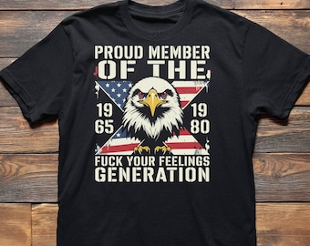May include: Black t-shirt with a graphic of an American bald eagle, the US flag, and the text "PROUD MEMBER OF THE...FUCK YOUR FEELINGS GENERATION" with the years 1965 and 1980.