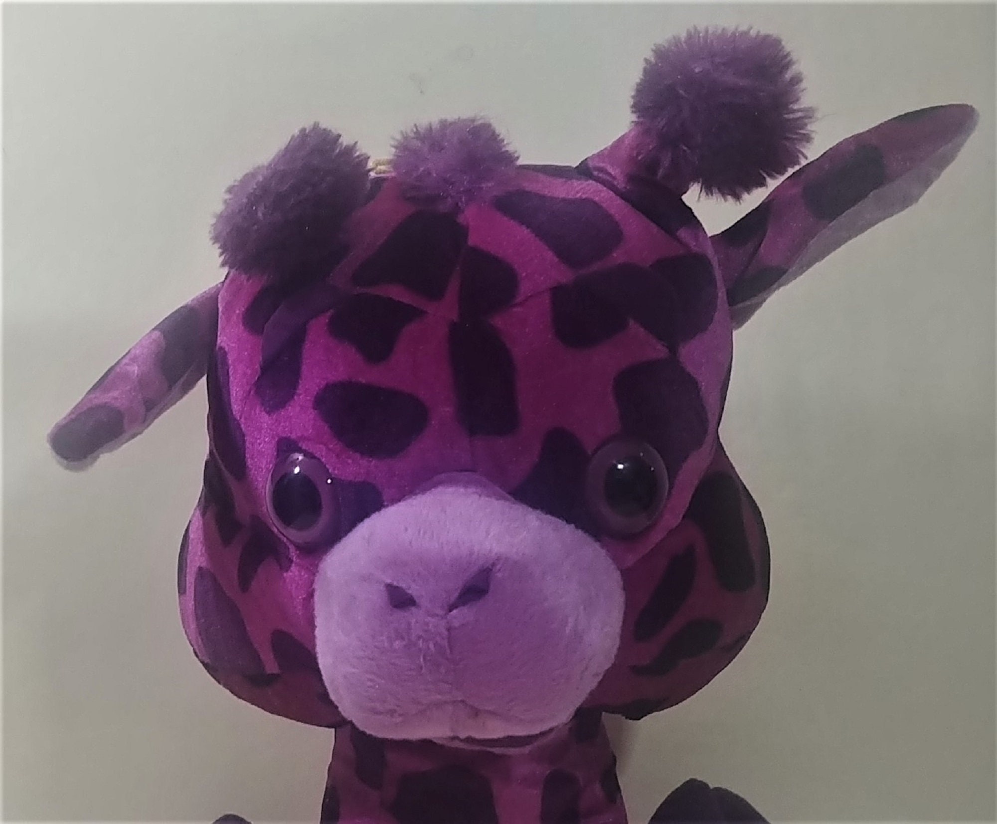 Purple giraffe 2024 stuffed animal
