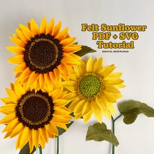 May include: Three felt sunflowers with yellow petals and brown centers are displayed against a white background. The sunflowers have green stems and leaves. Text in the upper right corner reads "Felt Sunflower PDF + SVG Tutorial DIGITAL DOWNLOAD."