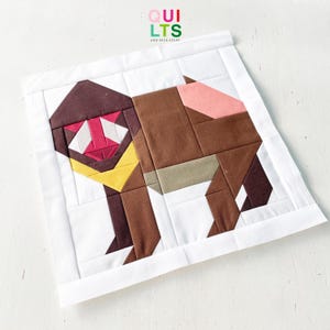 May include: A set of three ceramic mugs with a speckled, matte finish. The mugs are in shades of cream, light gray, and dark gray. Each mug has a simple, minimalist design and a rounded handle.