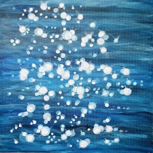 May include: Abstract acrylic painting on canvas. The artwork features a deep blue background with white, circular shapes and splatters, creating a sense of light and water. The painting is square and has a textured appearance.