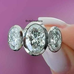 Breathtaking Design Oval Trio Diamond Ring, 3 TCW Oval Cut Colorless Moissanite Diamond Ring, Bezel Setting Three Stone 10k White Gold Ring