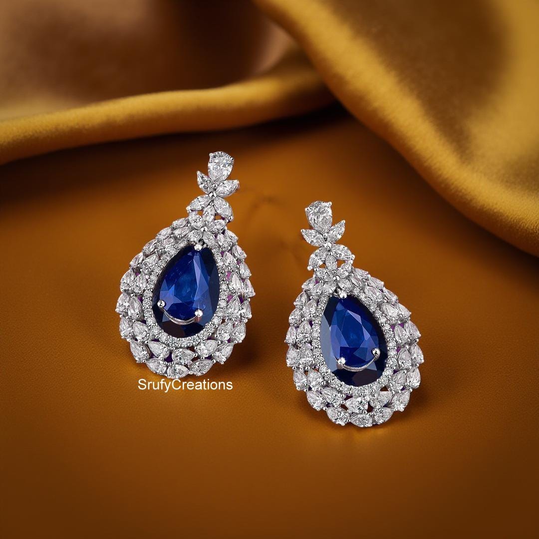 9月の誕生石イヤリング（18Kゴールド）、11 x 7 mmペアカットブルー