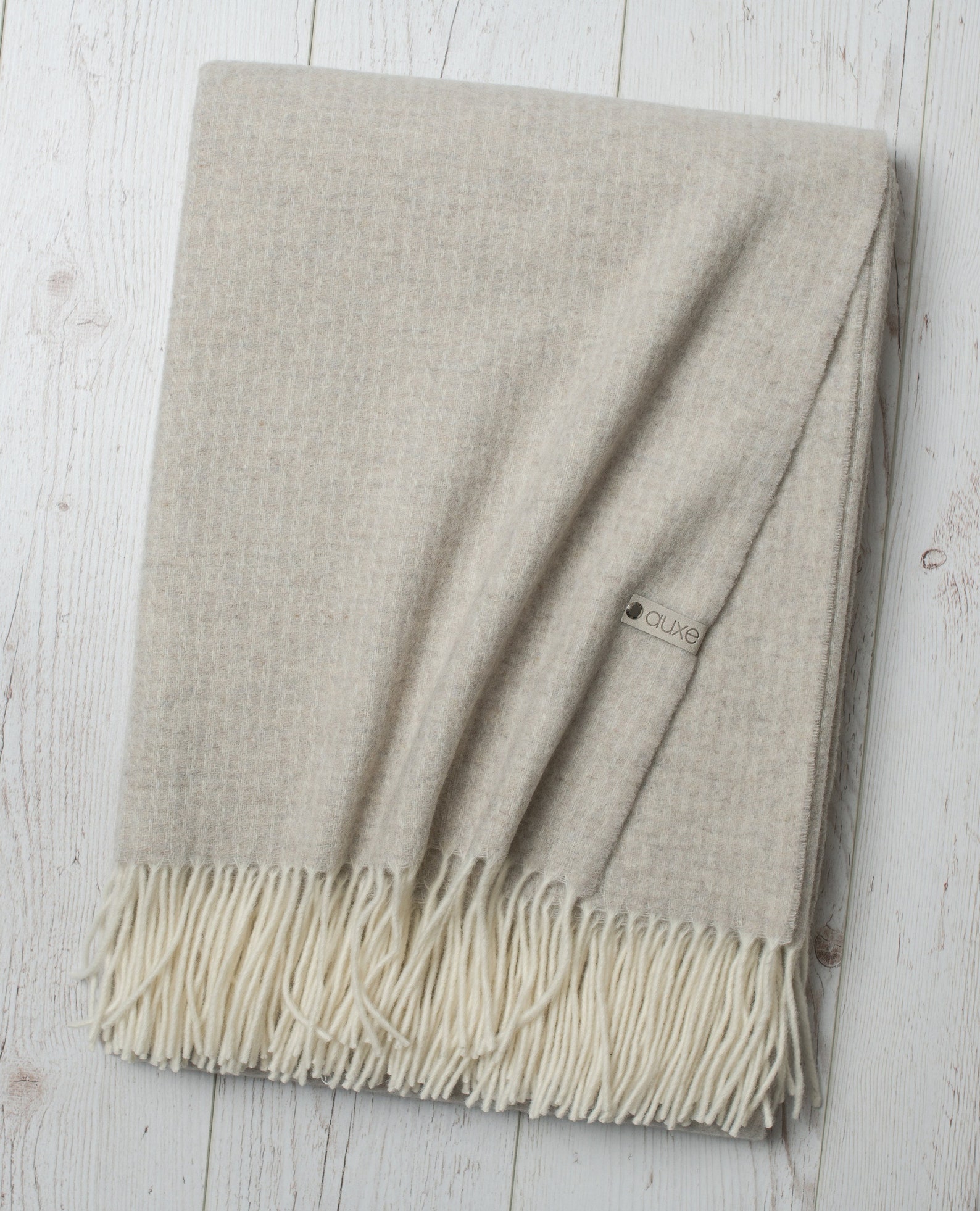 Soft merino and cashmere wool throw blanket with fringes on the short sides, Beige colour