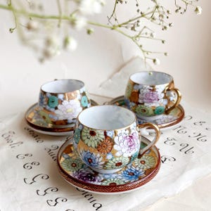 Kutani style coffee cup and saucer. Vintage KUTANI cup and saucer made in JAPAN. Multicolor flower demitasse made in Japan.