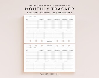May include: Two white printable PDF monthly habit tracker inserts for personal planners. Each page features a grid for daily tracking, with space for weekly and yearly goals. Text includes "Monthly Tracker" and "Habit Tracker".