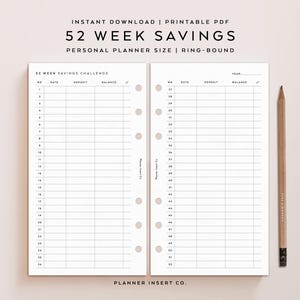 May include: A printable PDF planner insert with a 52-week savings challenge layout. The design features a grid with columns for the week, date, deposit, and balance. The text "52 WEEK SAVINGS" and "PERSONAL PLANNER SIZE" are at the top. A pencil rests on the side.