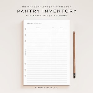 May include: A white A5 planner insert with the text "PANTRY INVENTORY" and a lined table for tracking products, quantity, and use-by dates. A wooden pencil rests beside the planner. The text "INSTANT DOWNLOAD | PRINTABLE PDF" is at the top.