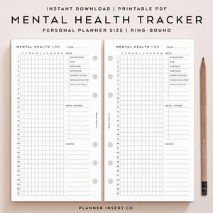 May include: A printable PDF mental health tracker with a grid layout for daily logs. The planner includes sections for recording feelings like depressed, sad, anxious, and panic attacks. A wooden pencil rests on the right side of the open planner.