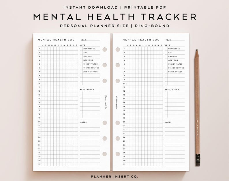 May include: A printable PDF mental health tracker with a grid layout for daily logs. The planner includes sections for recording feelings like depressed, sad, anxious, and panic attacks. A wooden pencil rests on the right side of the open planner.