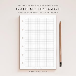 May include: A white grid notes page for a pocket planner with ring-bound holes. The page is next to a wooden pencil. The text on the page reads "GRID NOTES PAGE" and "POCKET PLANNER SIZE | RING-BOUND".
