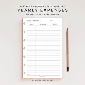 May include: A white printable yearly expenses planner insert for disc-bound systems in HP mini size. The page features columns for date, description, and amount, with the text YEARLY EXPENSES at the top. A wooden pencil is placed to the right.