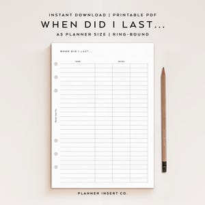 May include: A white ceramic mug with a black handle and the text "But First, Coffee" in a black, bold font. The mug is sitting on a wooden surface.