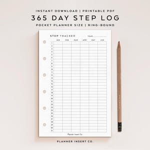 May include: A white 365 Day Step Log printable PDF with a step tracker grid, ring-bound, and pocket planner size. The text includes "Instant Download", "Step Tracker", and "Planner Insert Co." A wooden pencil rests beside the planner.