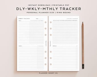 May include: A printable PDF planner insert with the text "DLY-WKLY-MTHLY TRACKER" and "PERSONAL PLANNER SIZE RING-BOUND". The insert features habit tracking sections for daily, weekly, and monthly use, with a grid layout for recording data. A pencil rests on the right side.