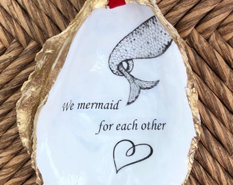 Nos regalamos una concha de ostra como regalo o un ostra pescador como regalo de sirena.