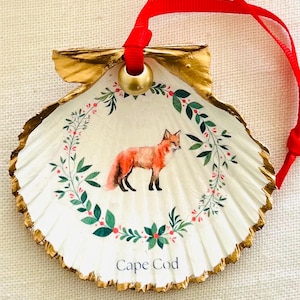 May include: A white ceramic mug with a wraparound design featuring a vibrant, colorful illustration of a toucan bird perched on a branch. The mug has a black handle and a glossy finish.