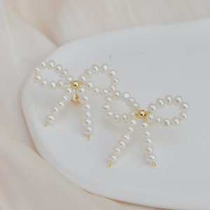 Handmade natural freshwater pearl stub earrings/stunning pearl bow earrings