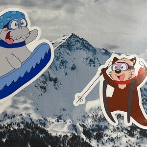 Snowboarding Manatee and Skiing Otter Double Pack