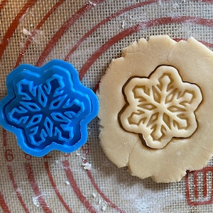 Sello de copo de nieve y cortador de contorno