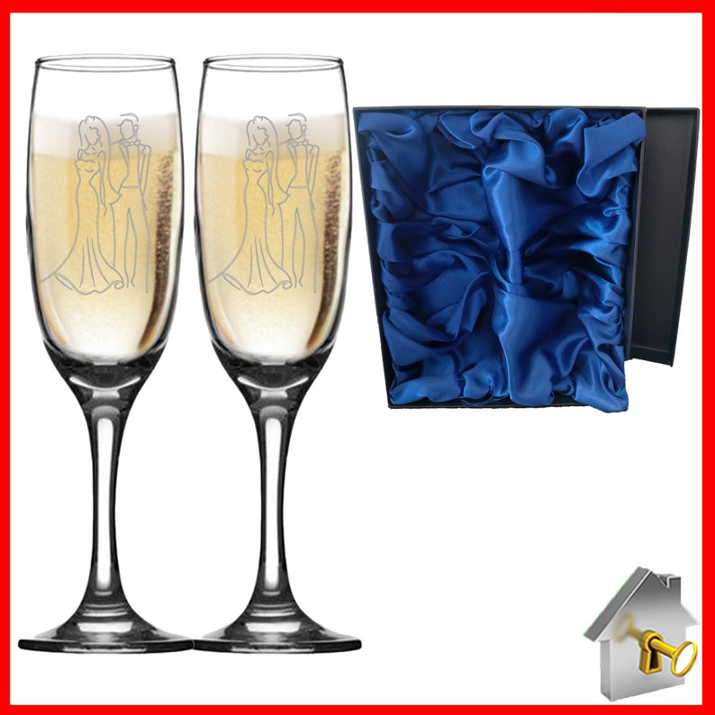 Personalised Wedding Gift. Champagne flute engraved on both sides with unique design. Bride& Groom image one sidewith Bride & Groom names on the reverse, entwined wedding rings image and the date of the wedding below. Optional Display Box option.