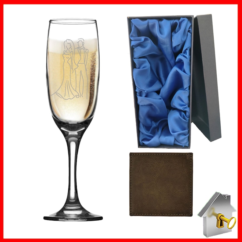 Personalised Wedding Gift. Champagne flute engraved on both sides with unique design. Bride& Groom image one sidewith Bride & Groom names on the reverse, entwined wedding rings image and the date of the wedding below. Optional Display Box option.