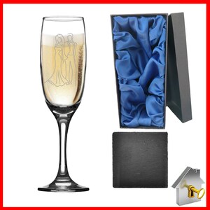 Personalised Wedding Gift. Champagne flute engraved on both sides with unique design. Bride& Groom image one sidewith Bride & Groom names on the reverse, entwined wedding rings image and the date of the wedding below. Optional Display Box option.