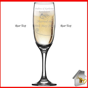Personalised Wedding Gift. Champagne flute engraved on both sides with unique design. Bride& Groom image one sidewith Bride & Groom names on the reverse, entwined wedding rings image and the date of the wedding below. Optional Display Box option.