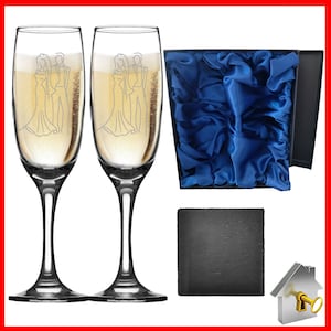 Personalised Wedding Gift. Champagne flute engraved on both sides with unique design. Bride& Groom image one sidewith Bride & Groom names on the reverse, entwined wedding rings image and the date of the wedding below. Optional Display Box option.