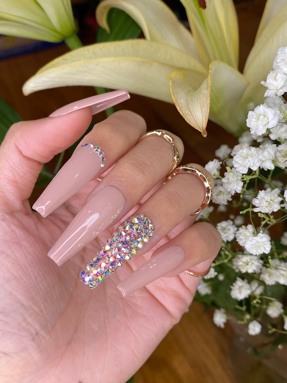 Nude Glitter Nails With Rhinestones – Trendy Things To Buy