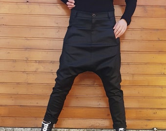 Extravagante dames harembroeken, wijde damesbroeken, avant-garde streetwear broek, zwarte losse broek, gotische broek, designer edgy mode