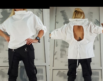 Asymmetrische witte tuniek: avant-garde top met halve mouwen