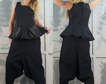 Asymmetrische neopreen top: avant-garde mouwloze tuniek
