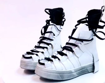 Zapatillas de piel blanca Avant Garde: zapatos extravagantes para mujer