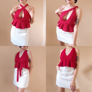 May include: Four different models wearing red crochet halter tops with white skirts. The tops have a ruffled hem and a plunging neckline. The skirts are all knee-length and have a simple design.